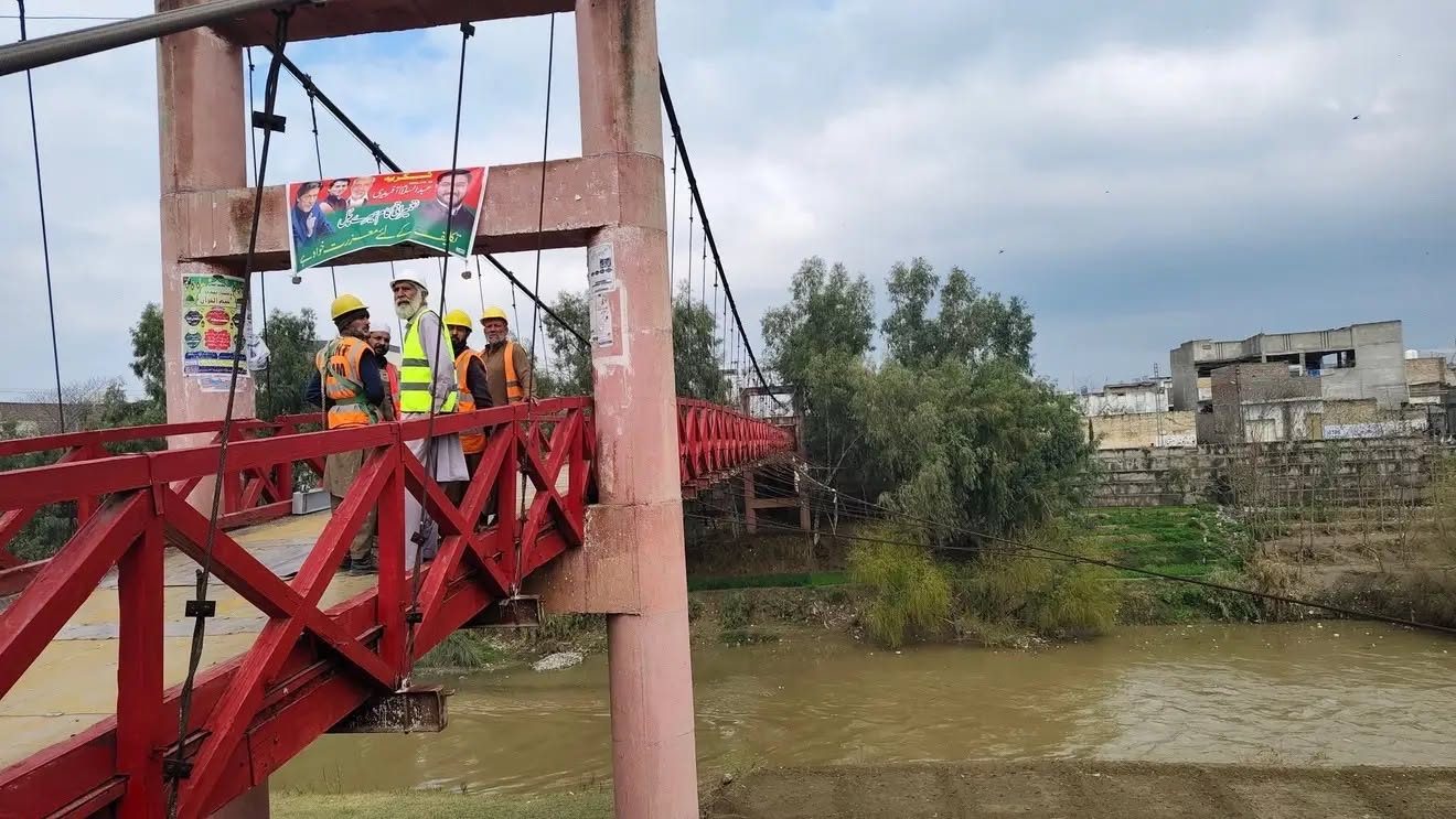 Red suspension bridge project by HBS Builders